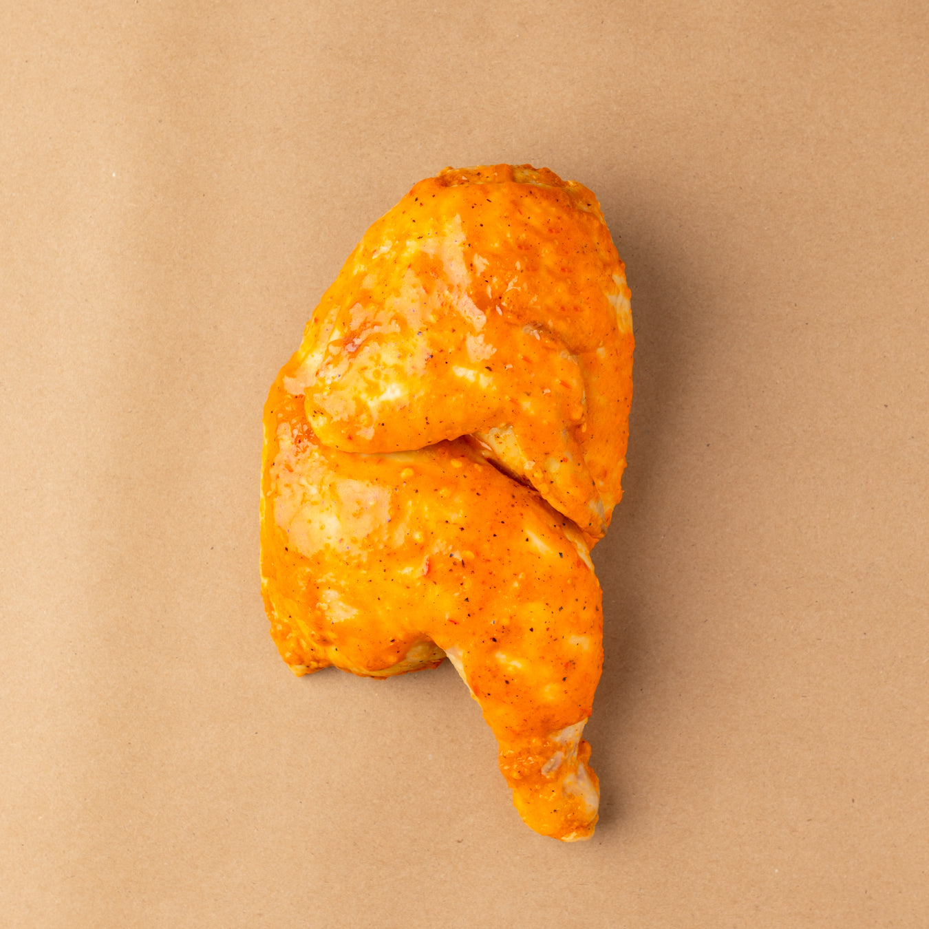 Demi-Poulet aux piments brûlés (précuit)