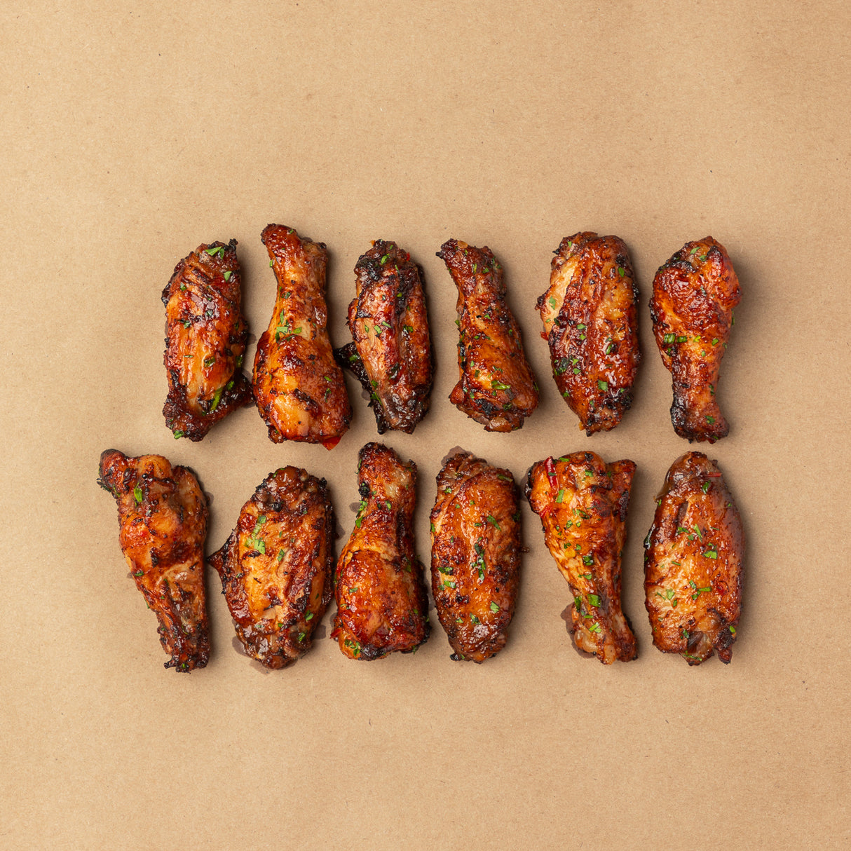 Ailes de poulet de grain du Québec, miel et piment brûlé (précuit)